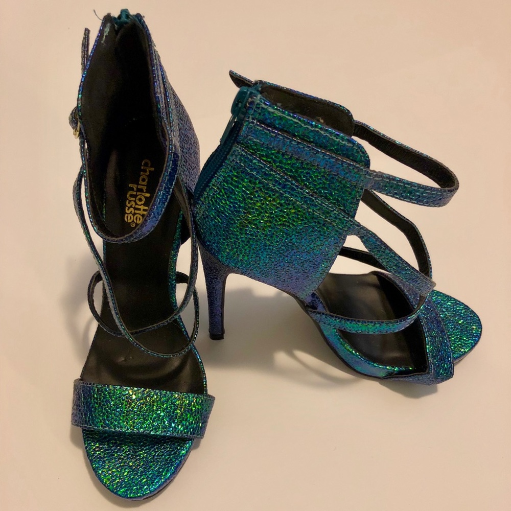 Emerald color “snake skin” heels.